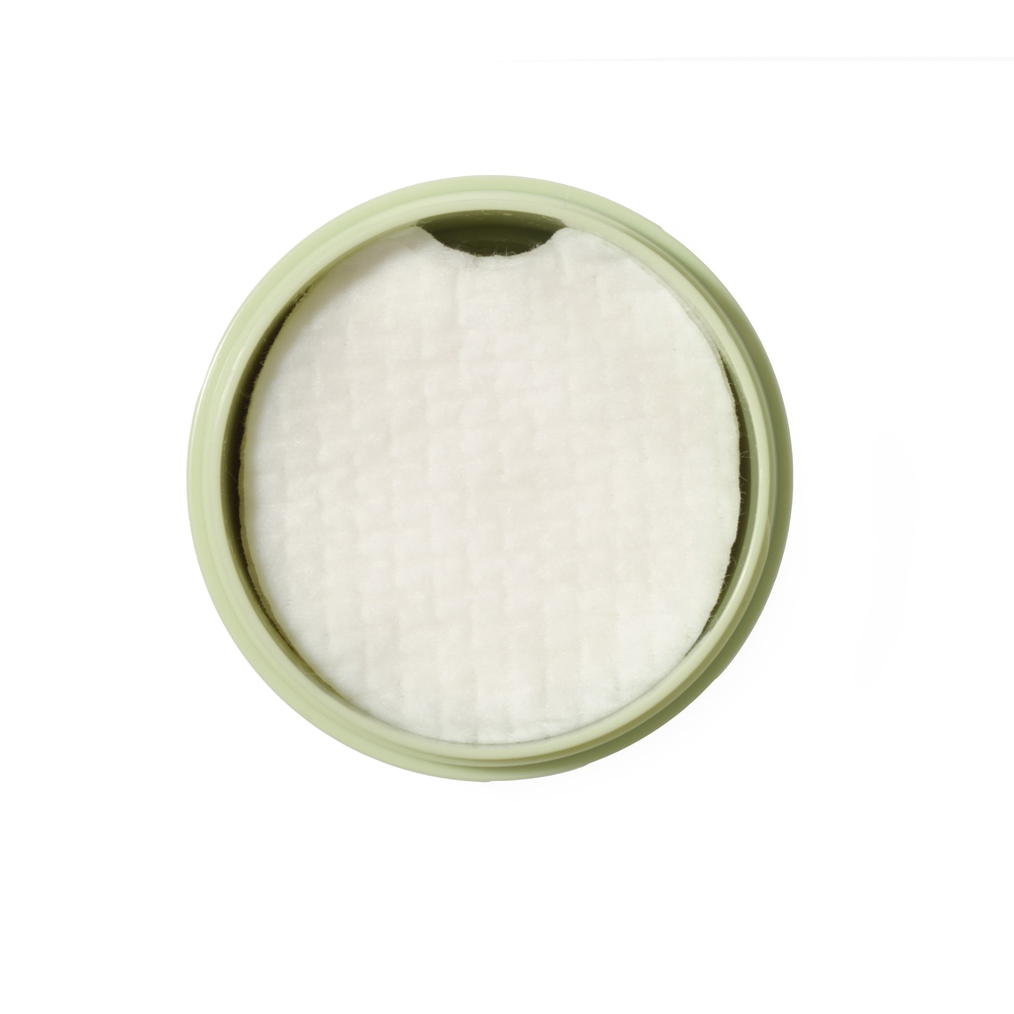 Round container with a green rim filled with white powder on a white background