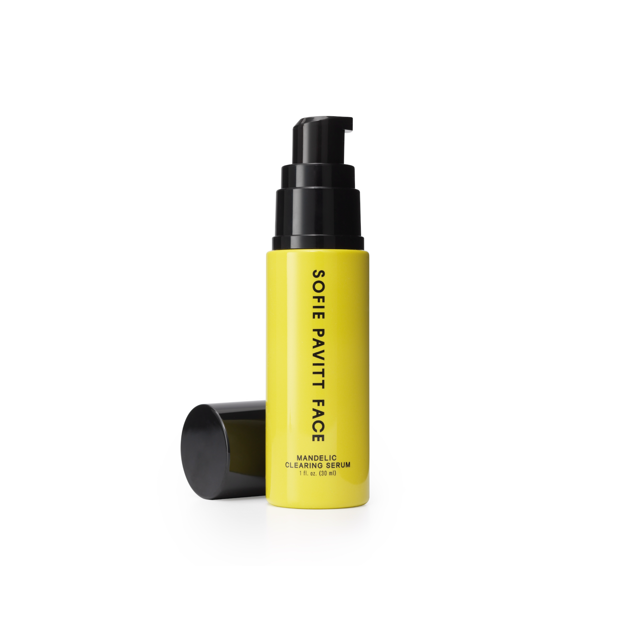 Yellow serum bottle with black pump on a white background