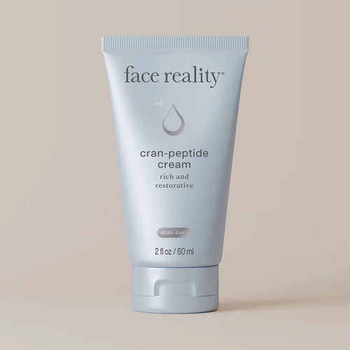 Face Reality Cran-Peptide Cream jar showing natural pink color on a clean background