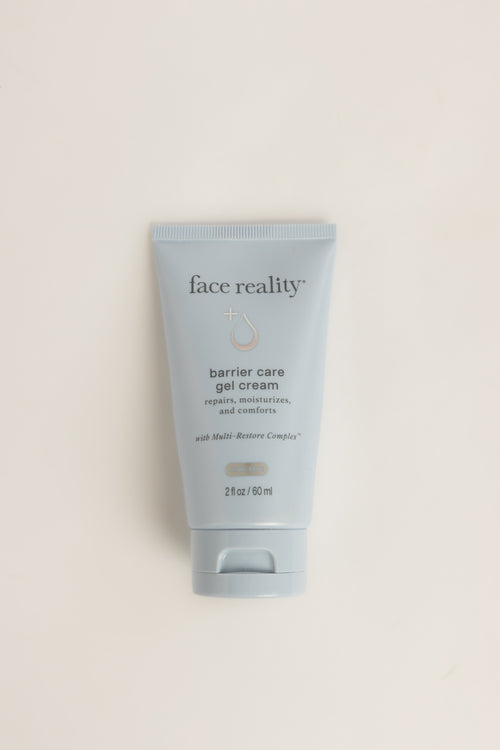 Light blue Face Reality Barrier Care Gel Cream tube with dark text, standing upright on a light background, net weight 2 fl oz (60 ml)