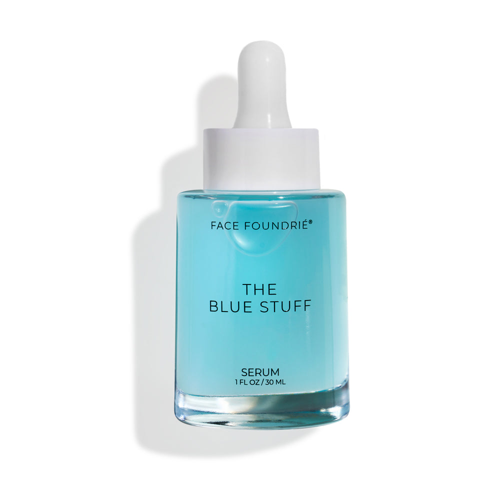 FACE FOUNDRIÉ The Blue Stuff Serum in a blue dropper bottle on a clean surface